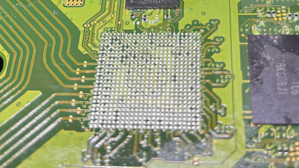 Motherboard pads cleaned and prepped for a BGA chip reflow at our micro soldering Georgetown repair lab.