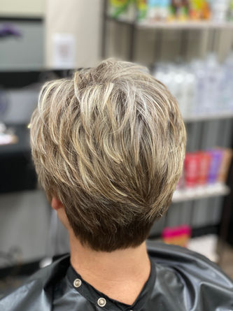 Hair color and haircut by Angel Mendoza 702.772.7300