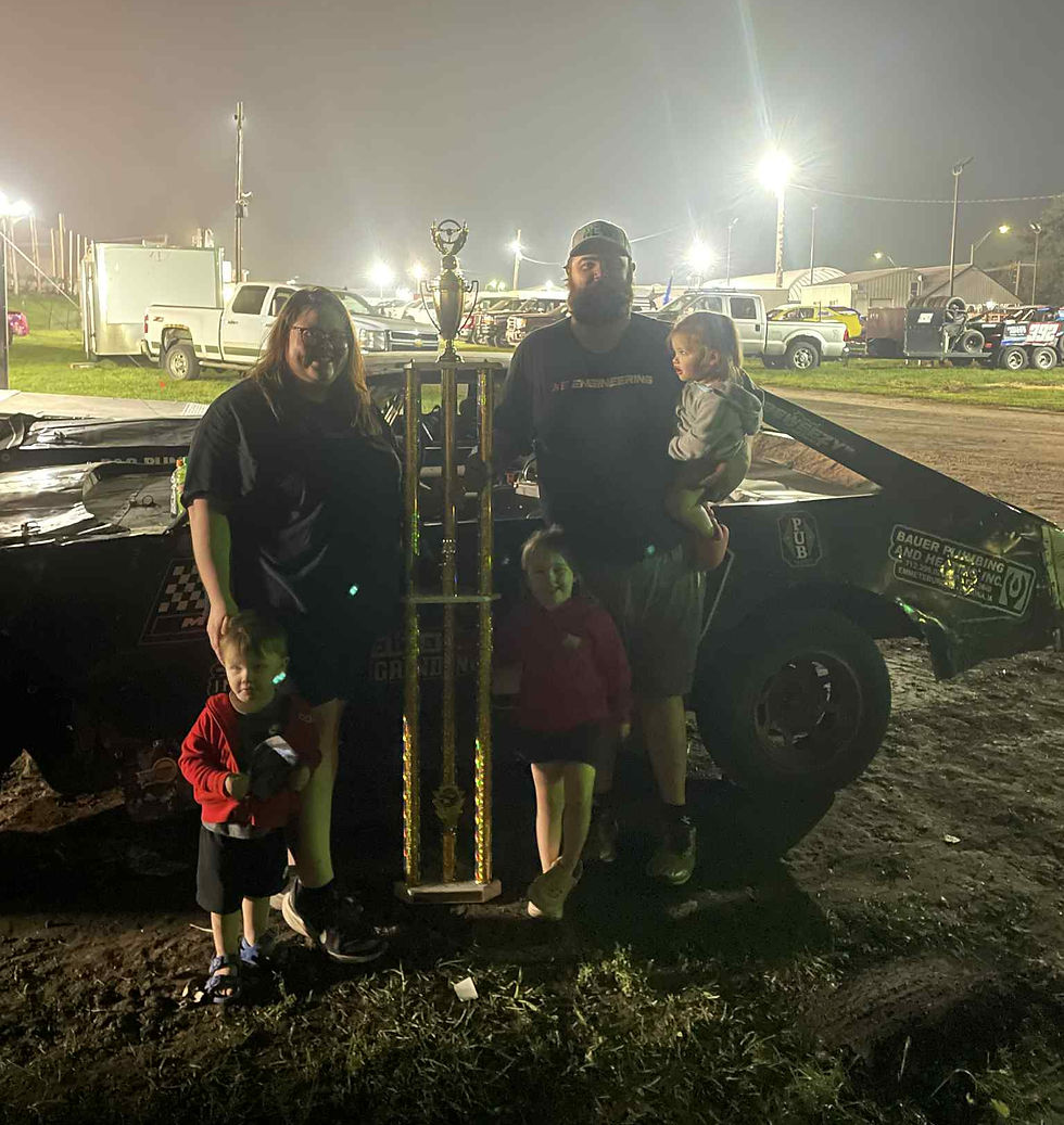 Outside of work, you'll find Harli and the kids cheering on Dad at the racetrack.