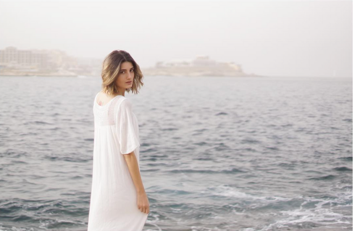 Experience the allure of beachside fashion as Martina Wallin presents her photography of beachwear dresses, photographed on the idyllic beaches of Malta in magical light