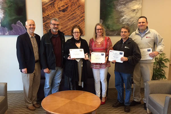 The 6-member ICF Team was recently presented with a Barrios Silver BEAR awards. Pictured from left are: The 6-member ICF Team was recently presented with a Barrios Silver BEAR awards. Pictured from left are: Robert McAfoos, Barrios Technology President; Jessica Henderson; Ann Herring; Mark Zutek; and Richard Morphis. Not Pictured: Mary Kerber and Todd O’Neal.