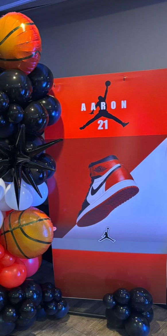 Basketball-inspired event graphics featuring sneaker artwork and bold red, blue and black colors.