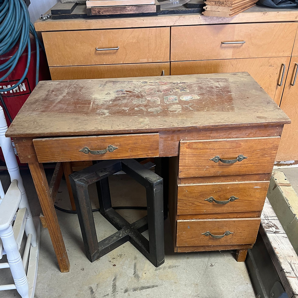 The desk in it's original state with the addition of Cabbage Patch stickers on top.