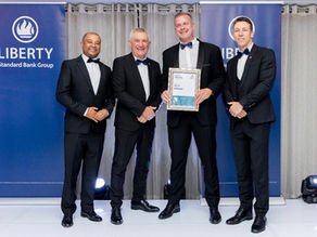 Financial planner receiving award