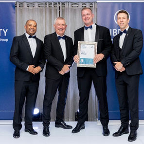 Financial planner receiving award