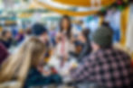 Group of people seated and in conversation