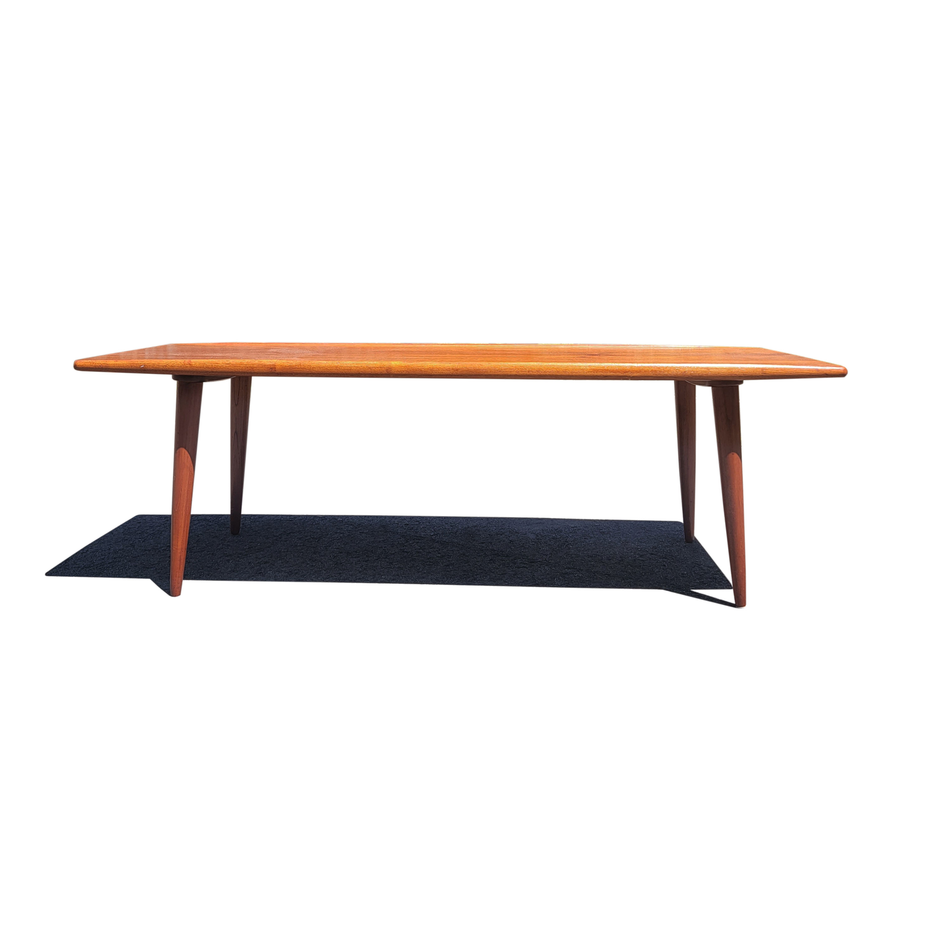 A Danish mid-century modern surfboard coffee table by Kristensen & Thomassen