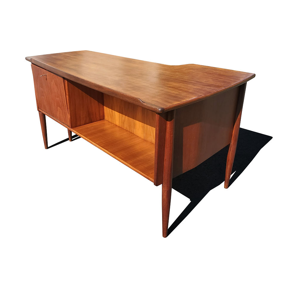 Thumbnail: A mid-century modern teak wood Boomerang desk by GORAN STRAND FOR LELÅNGS