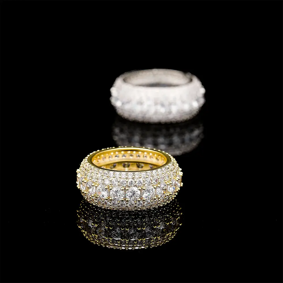 Thumbnail: Two diamond rings on black surface reflecting light, luxury jewelry.