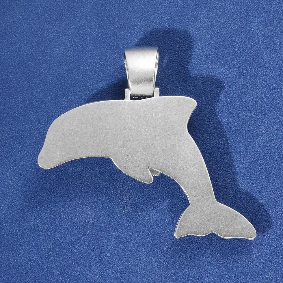 Thumbnail: Silver dolphin pendant on blue background, beautiful jewelry, The Kingdom Tattoos.