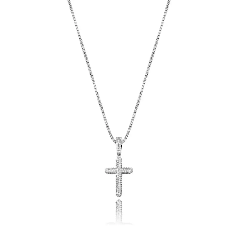 Thumbnail: Silver cross pendant necklace on display, religious jewelry item.