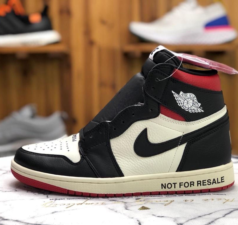 Thumbnail: Black and white Nike Jordan shoe with red trim, NOT FOR RESALE text.
