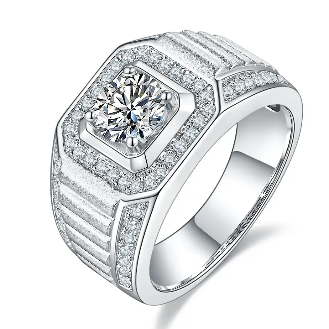 Silver ring with a large central diamond and many smaller jewels.