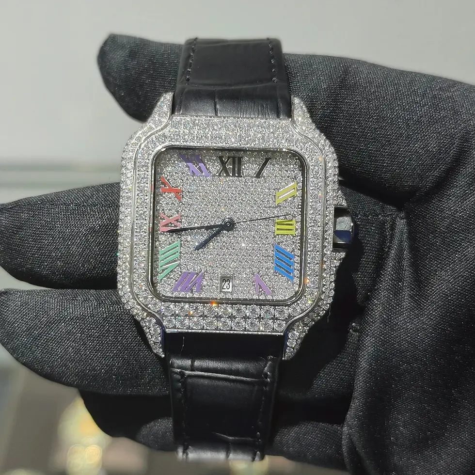 Luxury diamond watch with black leather strap, colorful accents, and Roman numerals.