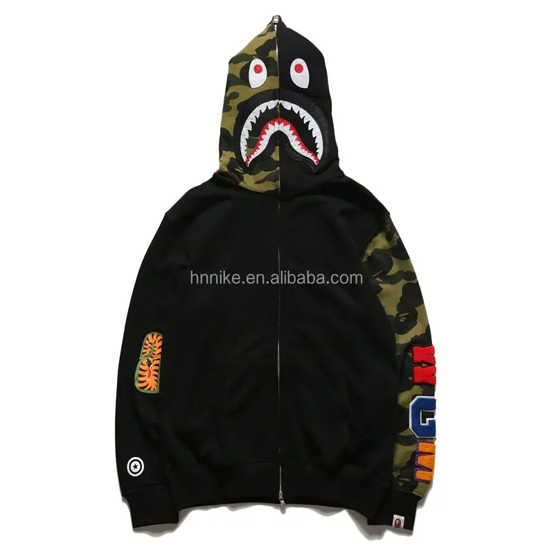 Thumbnail: Black shark hoodie with camo print and website address on white background.