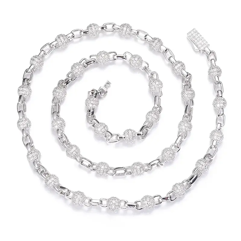 Thumbnail: Silver necklace with decorative beads and chain on white background.