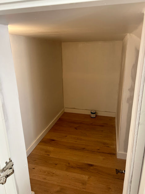 MTC basement under stairs crawl space