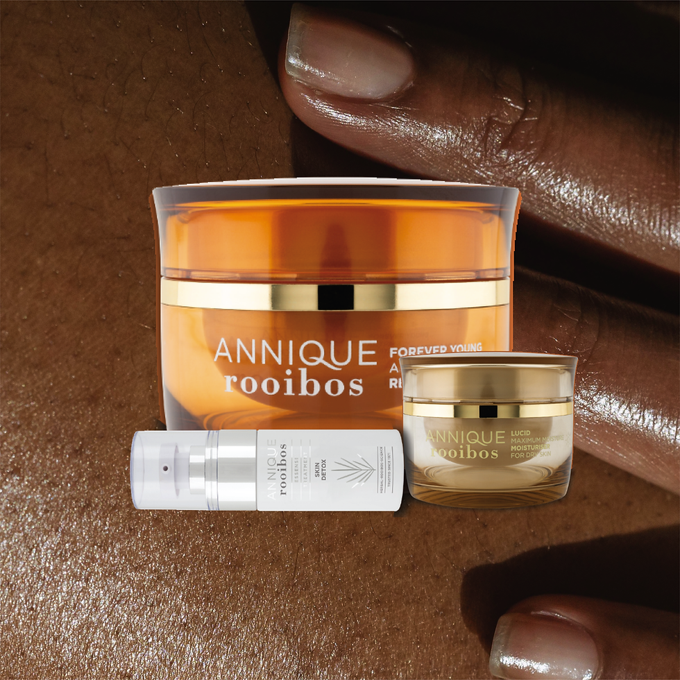 Annique Rooibos Products with a background of oiled hand