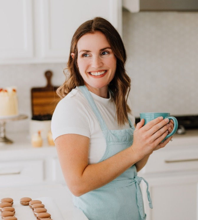 Baker with macarons