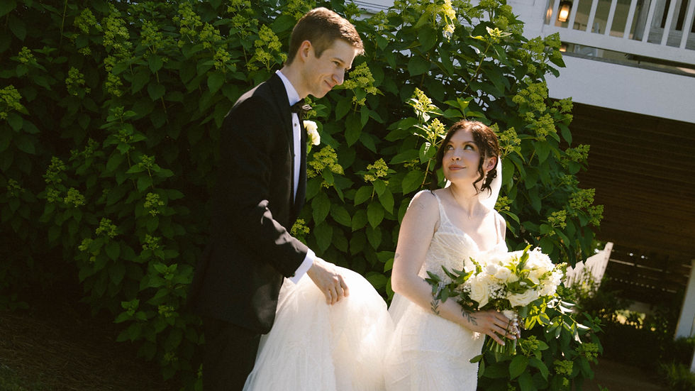 Gorgeous brunette bride with handsome husband on hot summer day
