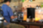 Terra Water Vintage Black Enamel Filter in a cafe.
