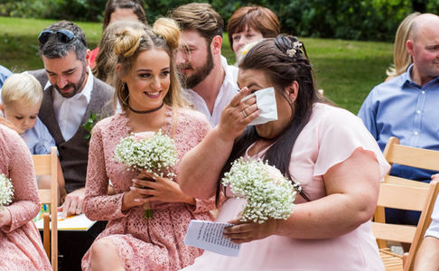 Bridesmaid wiping her tears away during an emotional wedding at Pimhill Barn, Shrewsbury. Taken by Shropshire wedding photographer, Nicki Jones Photography