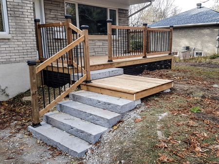 wood deck with stone stairs