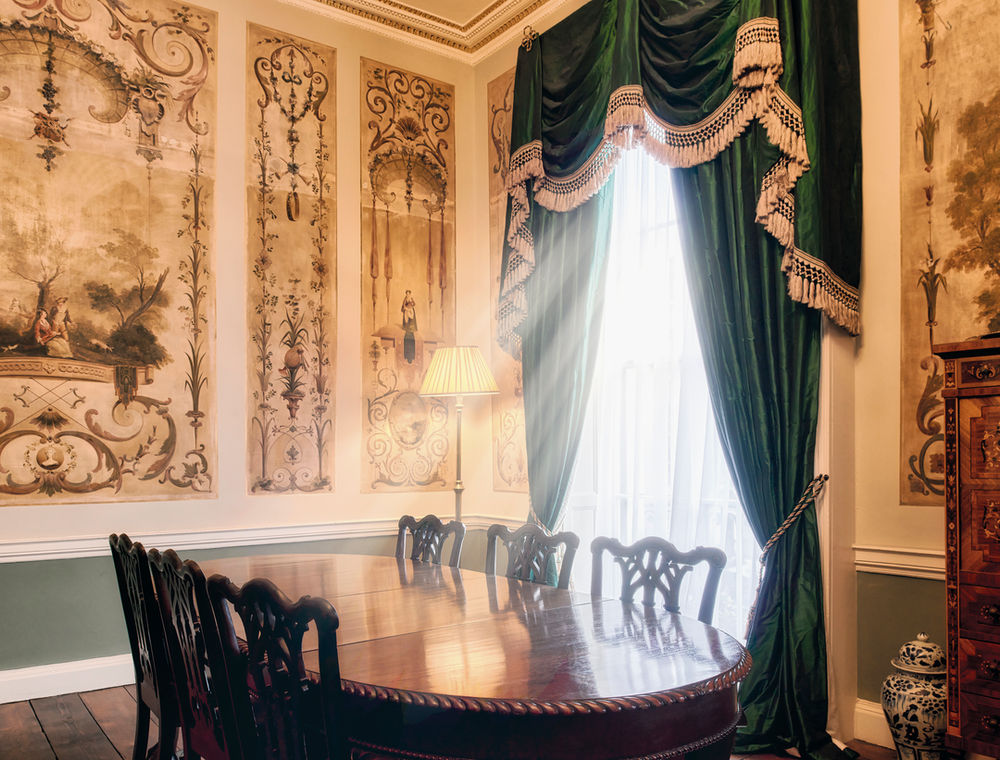 The boardroom at 29 Fitzwilliam Street Upper, with its painted panels and tall window