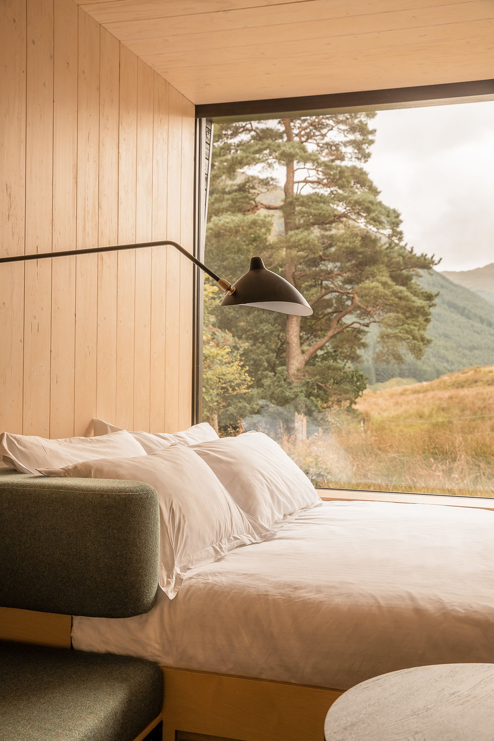 The first Corr cabin at Monachyle Mhor where the bed overlooks the land and surrounding hills