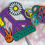 Thumbnail: Bright Hippy Peace Daisy Cake Topper