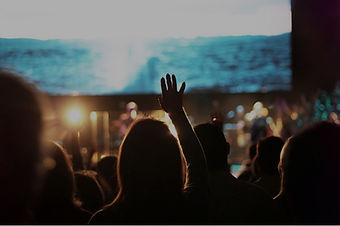 Image of people lifting hands