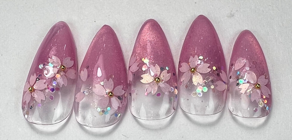 Pink magnet color and cherry blossom hologram nail design