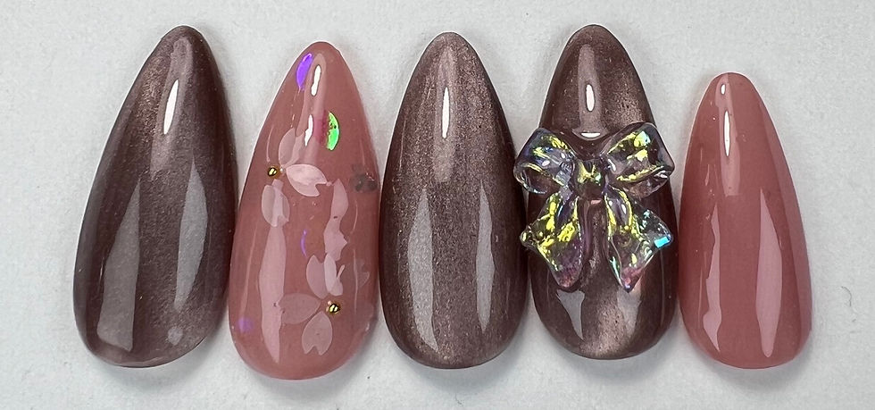 Adult spring nails with nude colors and magnets nail design