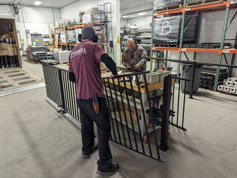 Aluminum Shop Workers working on our aluminum railing sections
