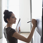 Woman Writing Notes
