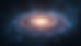 Wide angle view of a spiral galaxy with bright core and swirling arms