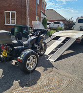 Trike bike recovery being winched onto truck