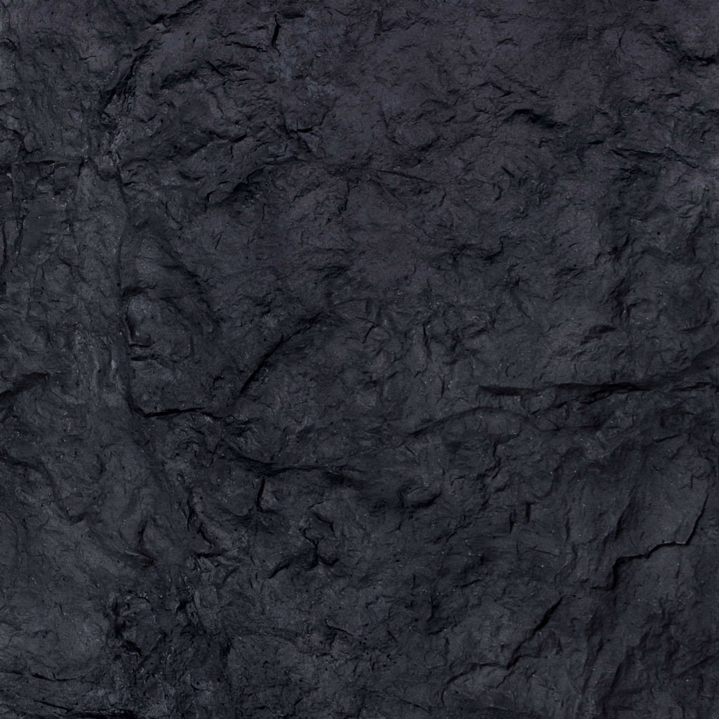 Close-up of STONIKO Mountain Rock showing detailed ridges and geological formation patterns.