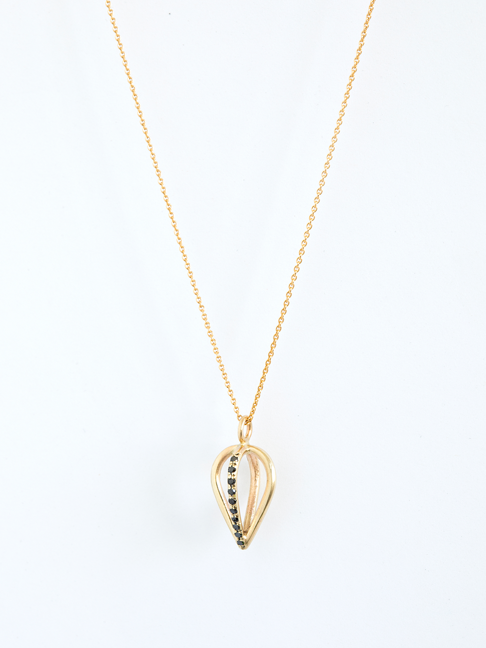 Gold tear with Black Diamonds