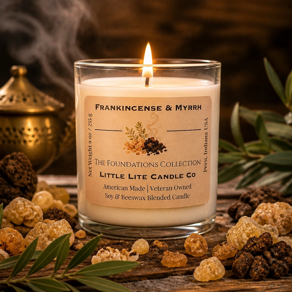 Thumbnail: Frankincense & Myrrh 9 oz tumbler soy candle burning on wooden surface with resin pieces and smoke
