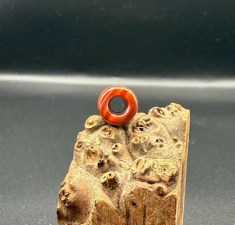 Thumbnail: Brown juma integrated tip. 
