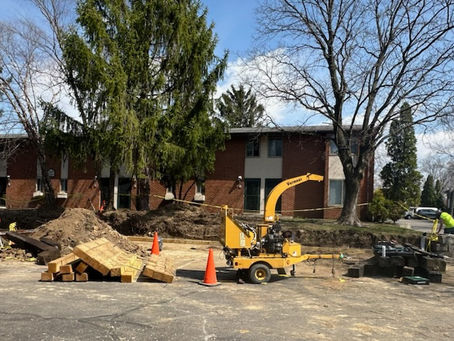 Property maintenance team performing exterior maintenance at a commercial property in Fort Wayne, Indiana.