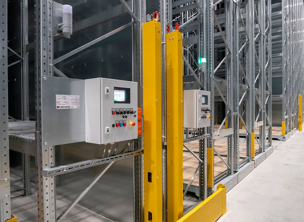 Industrial control panel on metal shelving unit