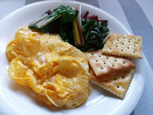 糠漬けたくわんと溶けるチーズのスクランブルエッグ