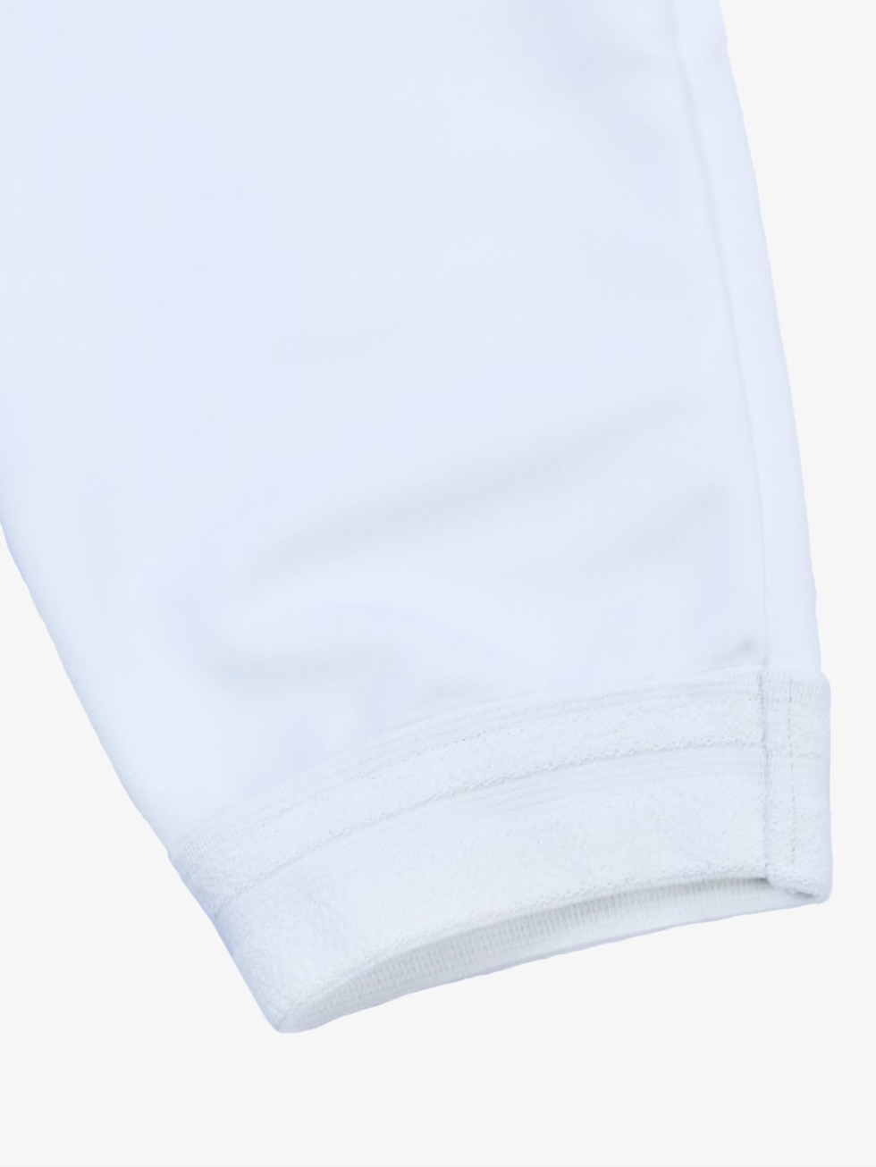 Ferre Fencing Kids Pants Pro close-up showing ankle cuff, stitching, and white protective fabric