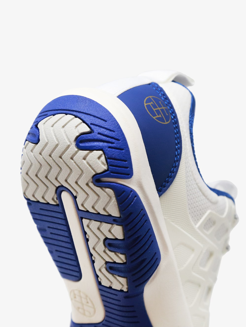 Fencing Star Shoes close-up showing blue and white treaded sole, heel support, stitching, and side logo