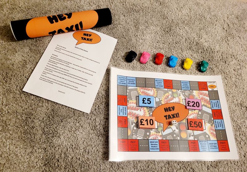 Hey Taxi! board game components: board, cars, instructions