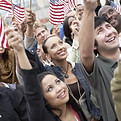People waving American flags