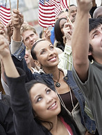 People waving American flags