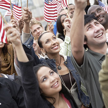People waving American flags
